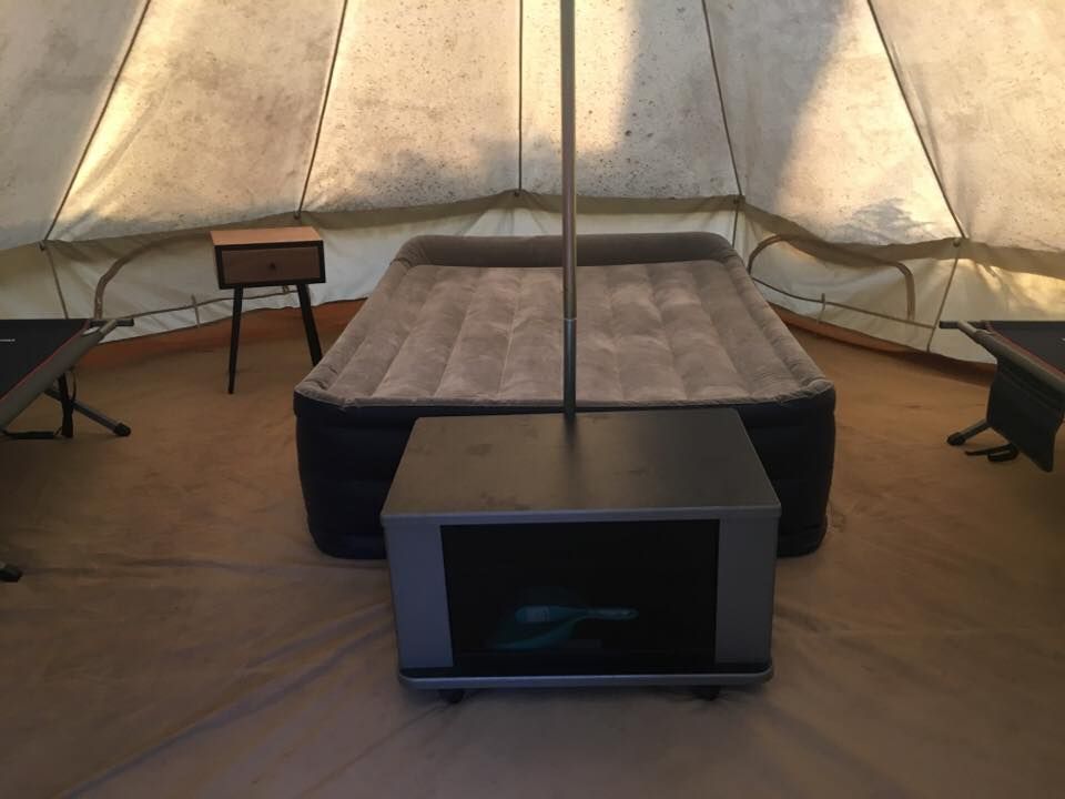 A picture of the inside of a bush bell tent